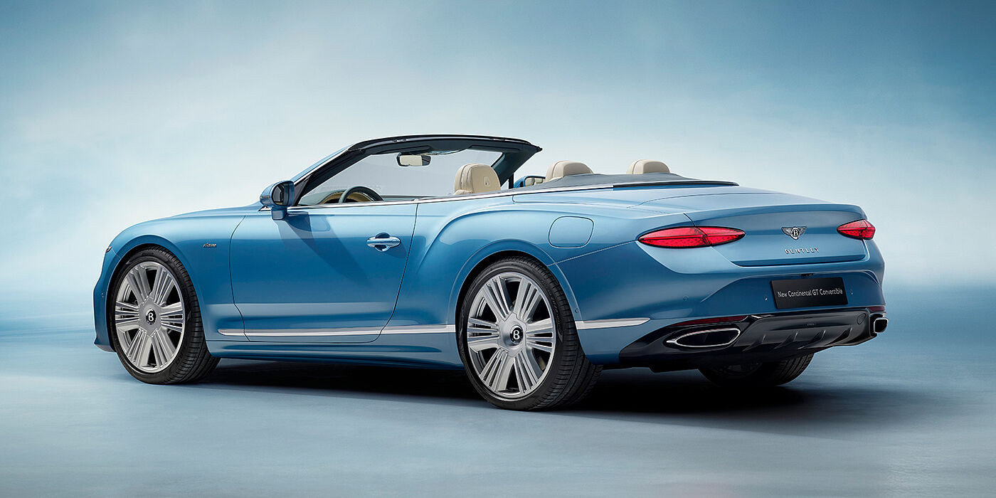 Bentley Cyprus New Bentley Continental GTC Azure convertible rear view in Light Windsor blue paint with 22 inch ten spoke wheels and chrome exterior details
