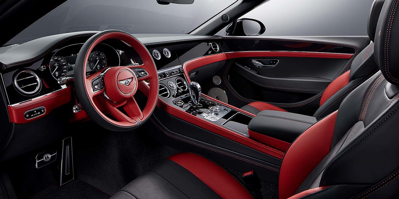 Bentley Cyprus Bentley Continental GTC S convertible front interior in Beluga black and Hotspur red hide with high gloss carbon fibre veneer