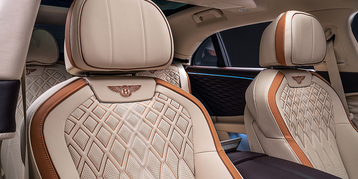 Bentley Cyprus Bentley Flying Spur Odyssean sedan rear seat detail with Diamond quilting and Linen and Burnt Oak hides