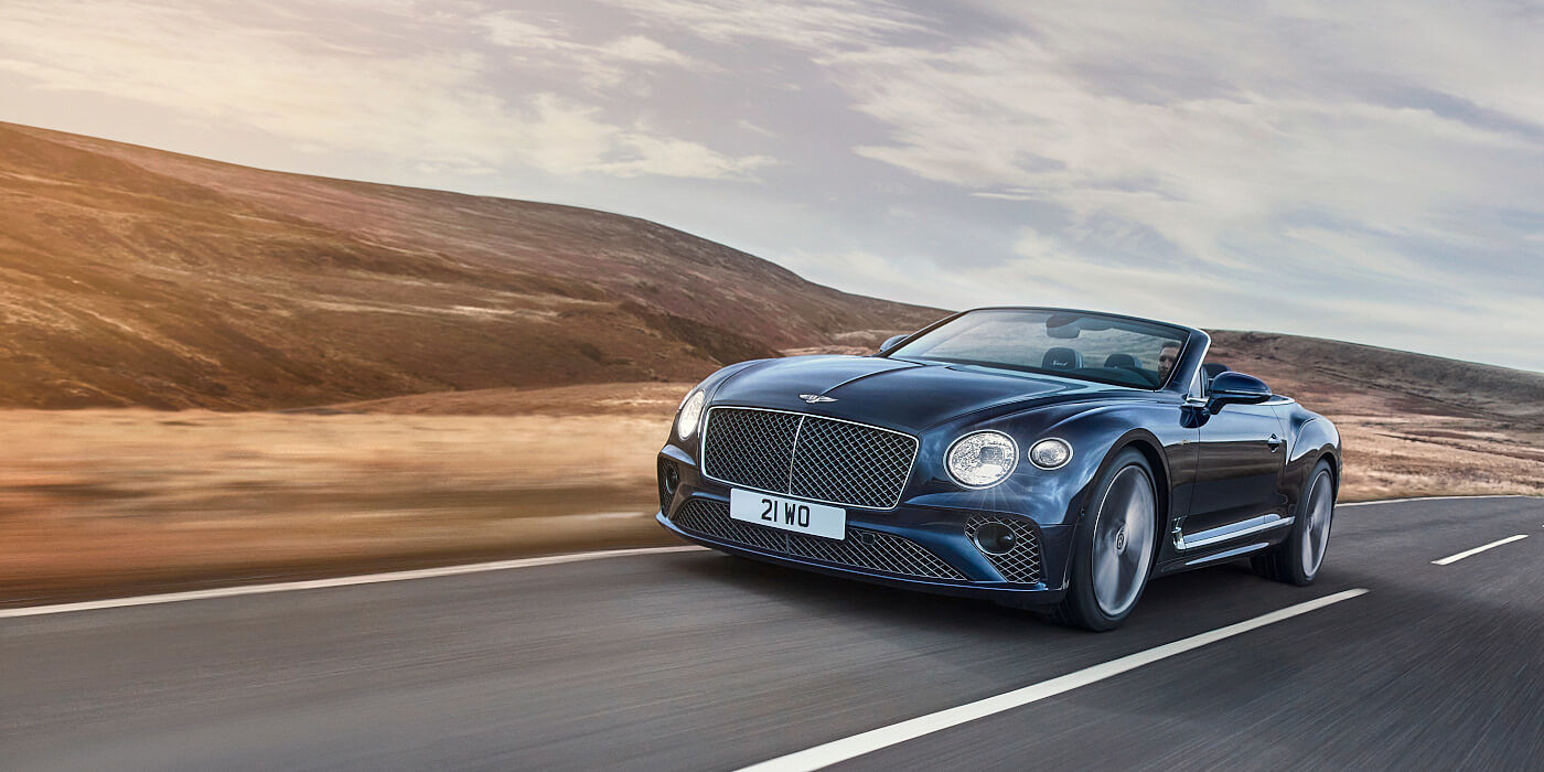 Bentley Cyprus Bentley Continental GTC Speed convertible in Peacock paint side front 34 dynamic