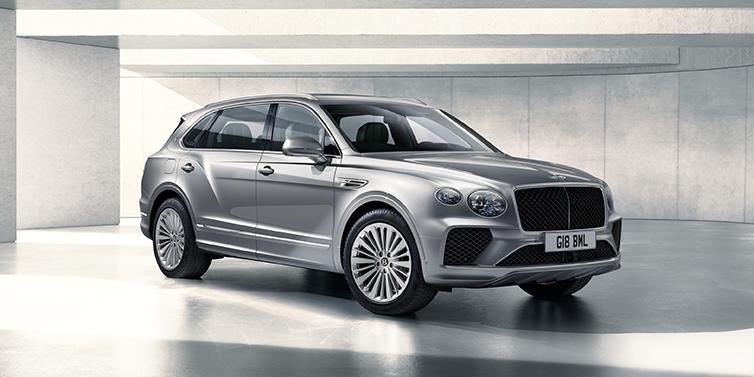 Bentley Cyprus Bentley Bentayga Extended Wheelbase SUV front three quarter in Moonbeam paint with a grey background